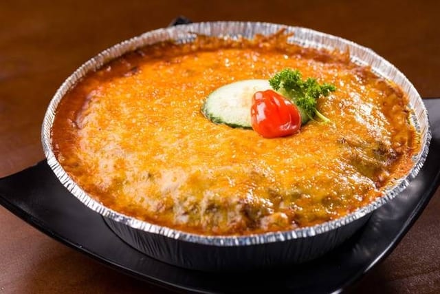 Baked Bolognese Spaghetti with Cheese.