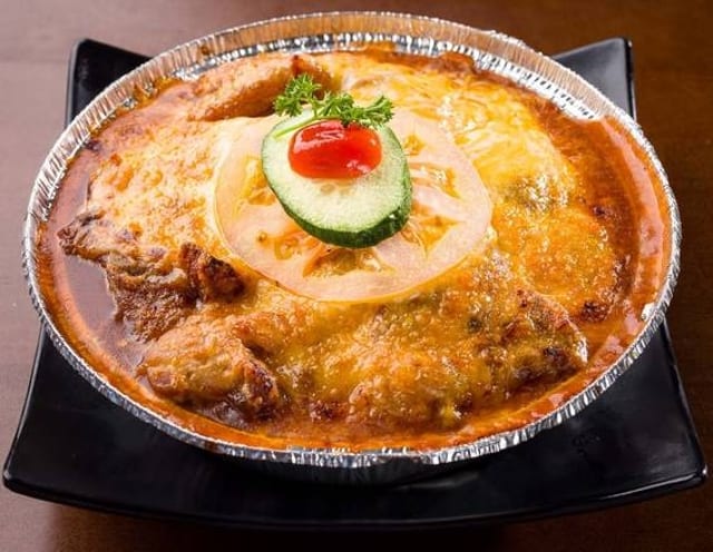 Baked Pork Chop with Cheese.